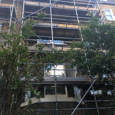 flats with scaffolding